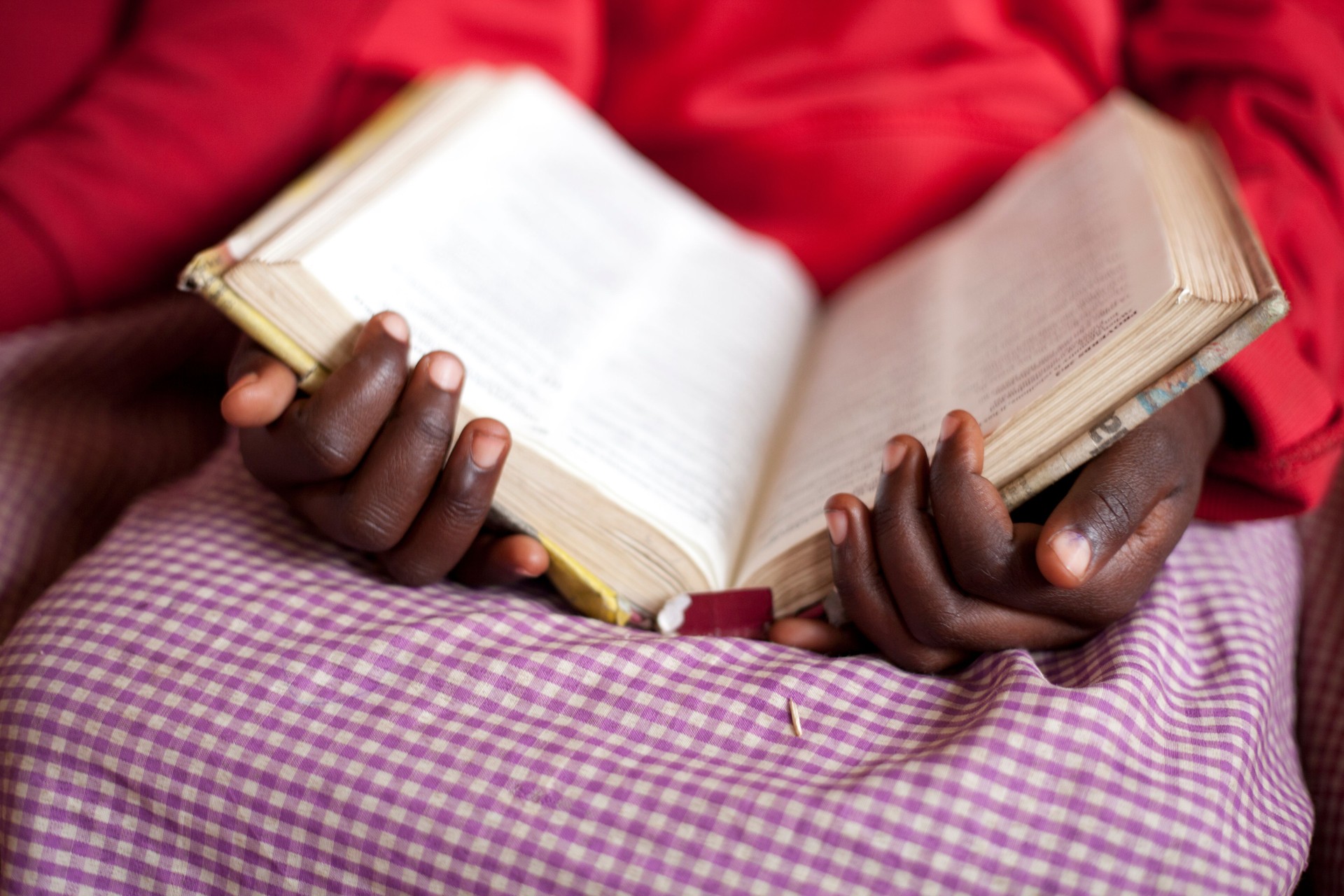 African School Girl reading Bible